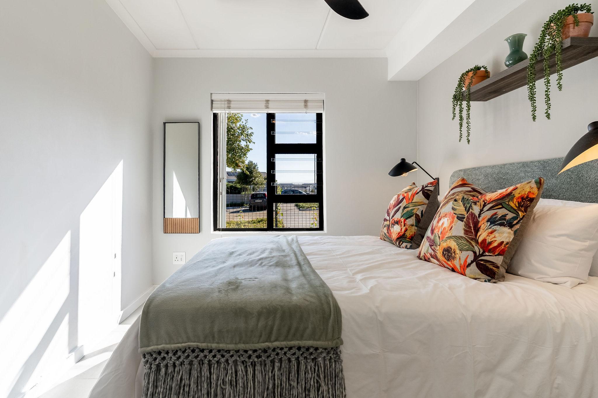 Cape Vine bedroom with double bed and garden view