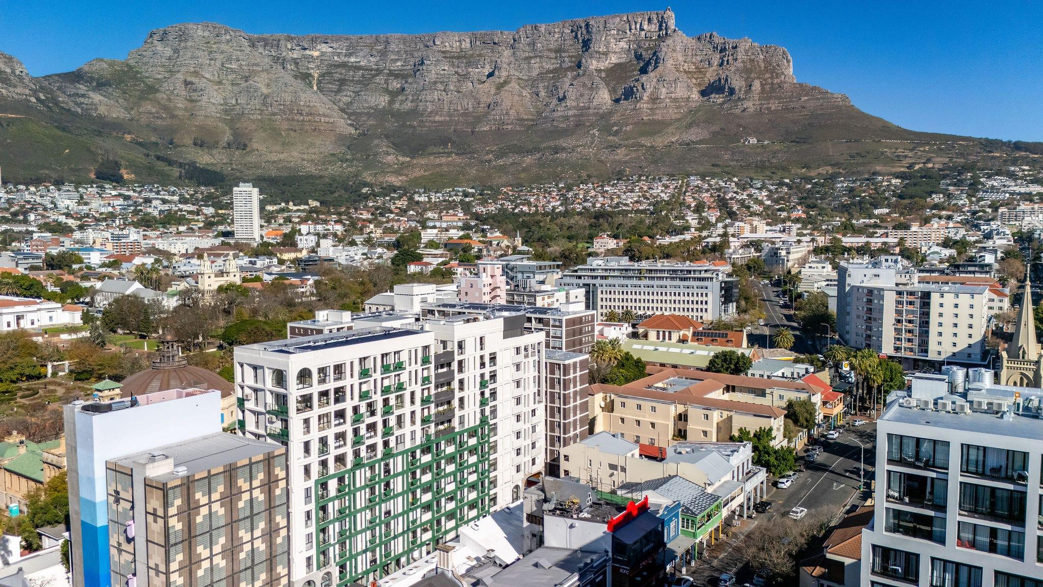 Aerial view of the Cape Town CBD with Table Mountain rising above the rooftops