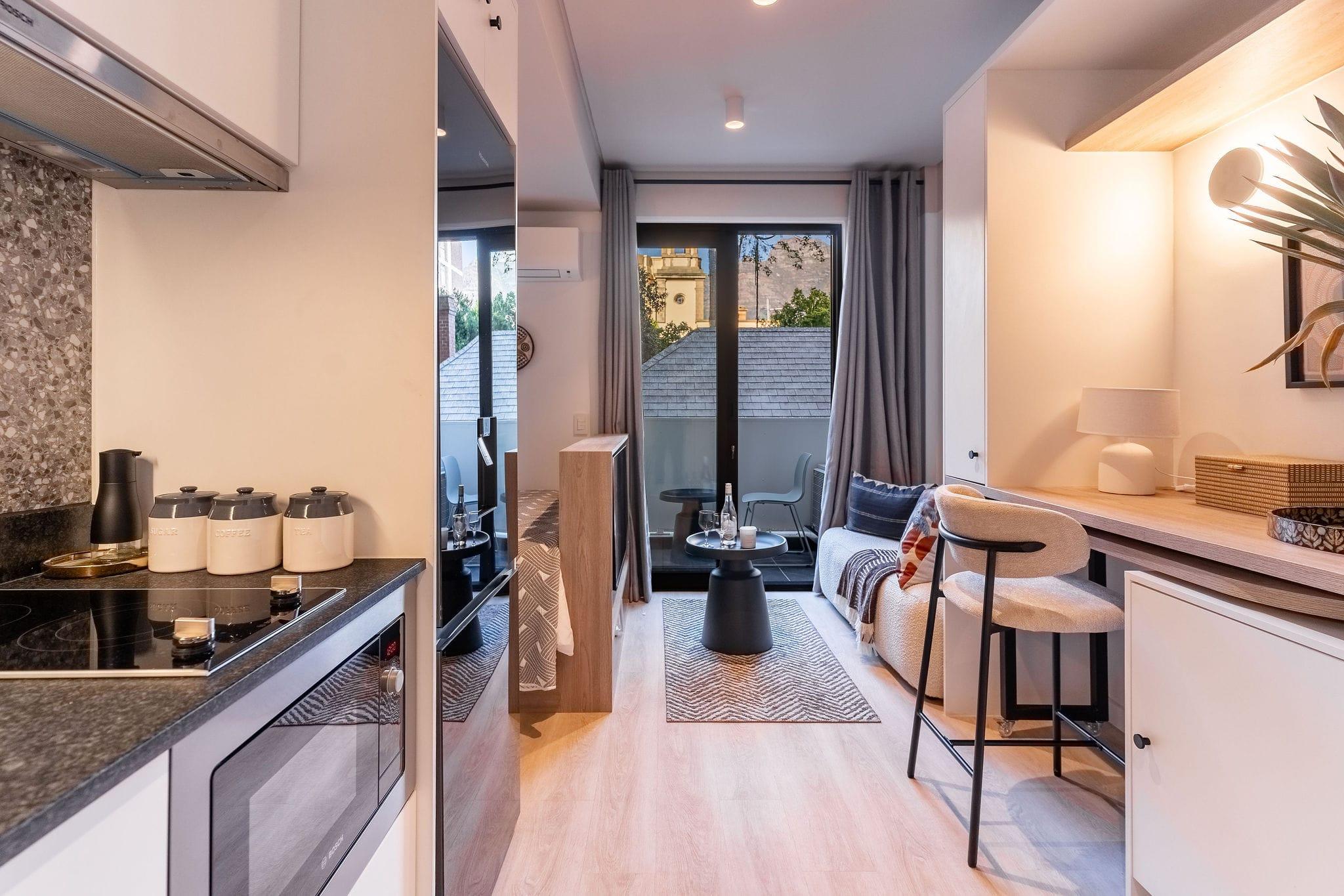 Centrepark open-plan studio from the kitchenette through to the lounge and balcony